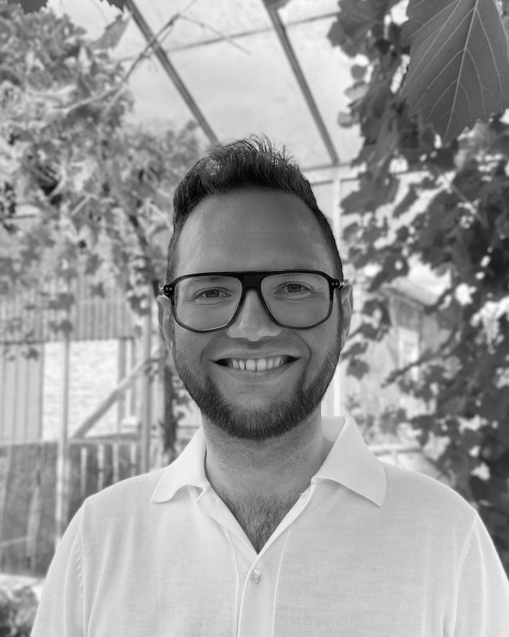 Rasmus Hilstrøm Bach-Lauritsen, grundlægger af PremiumBottles, smilende portræt.